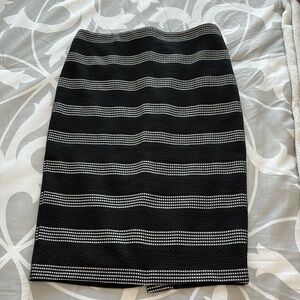 Classic knee length skirt!  Black with white.